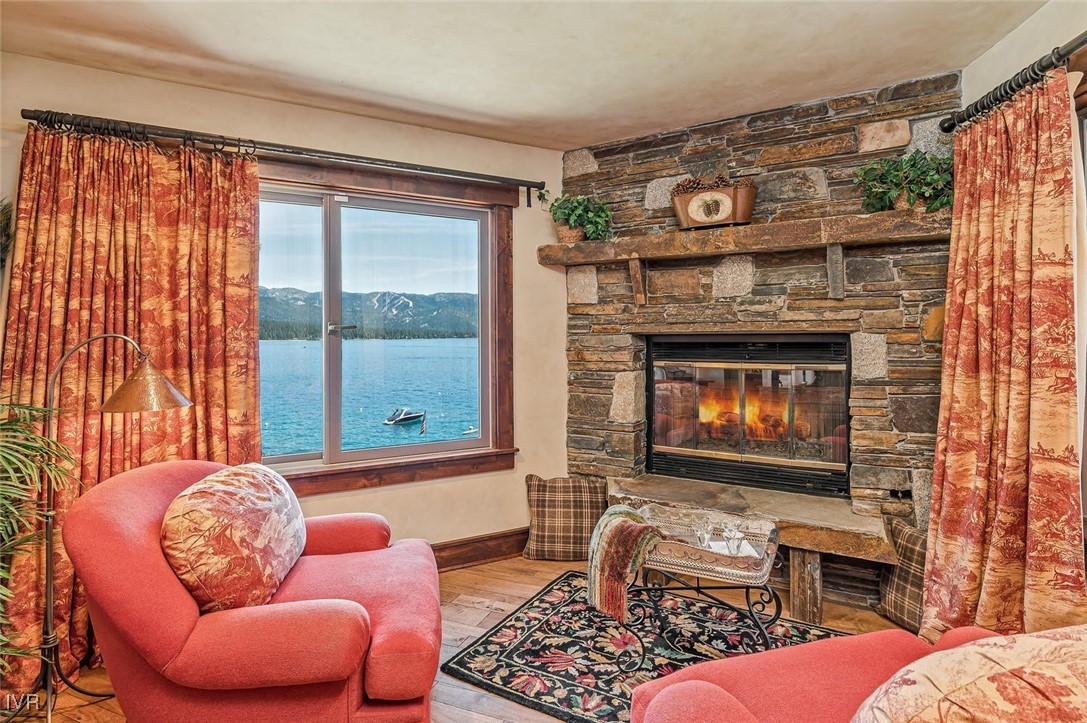 422 Gonowabie Road Crystal Bay, NV 89402 - Photo 19 of 49 a living room with furniture and a fireplace