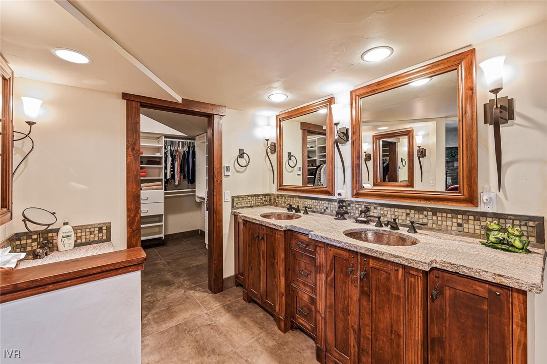 422 Gonowabie Road Crystal Bay, NV 89402 - Photo 26 of 49 a bathroom with a sink and a mirror