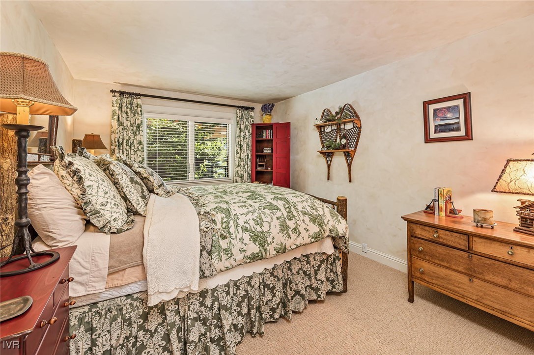 422 Gonowabie Road Crystal Bay, NV 89402 - Photo 30 of 49 a bed sitting in a bedroom next to a window