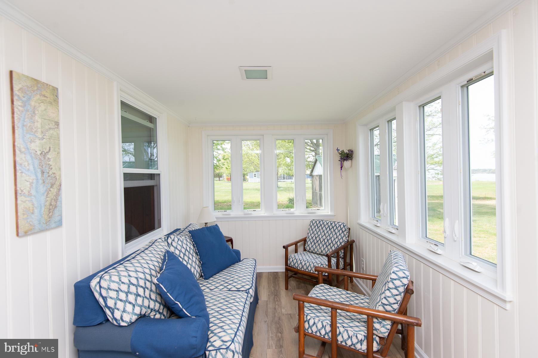 724 Twin Point Cove Road Cambridge, MD 21613 - Photo 25 of 60 Sunroom sitting area