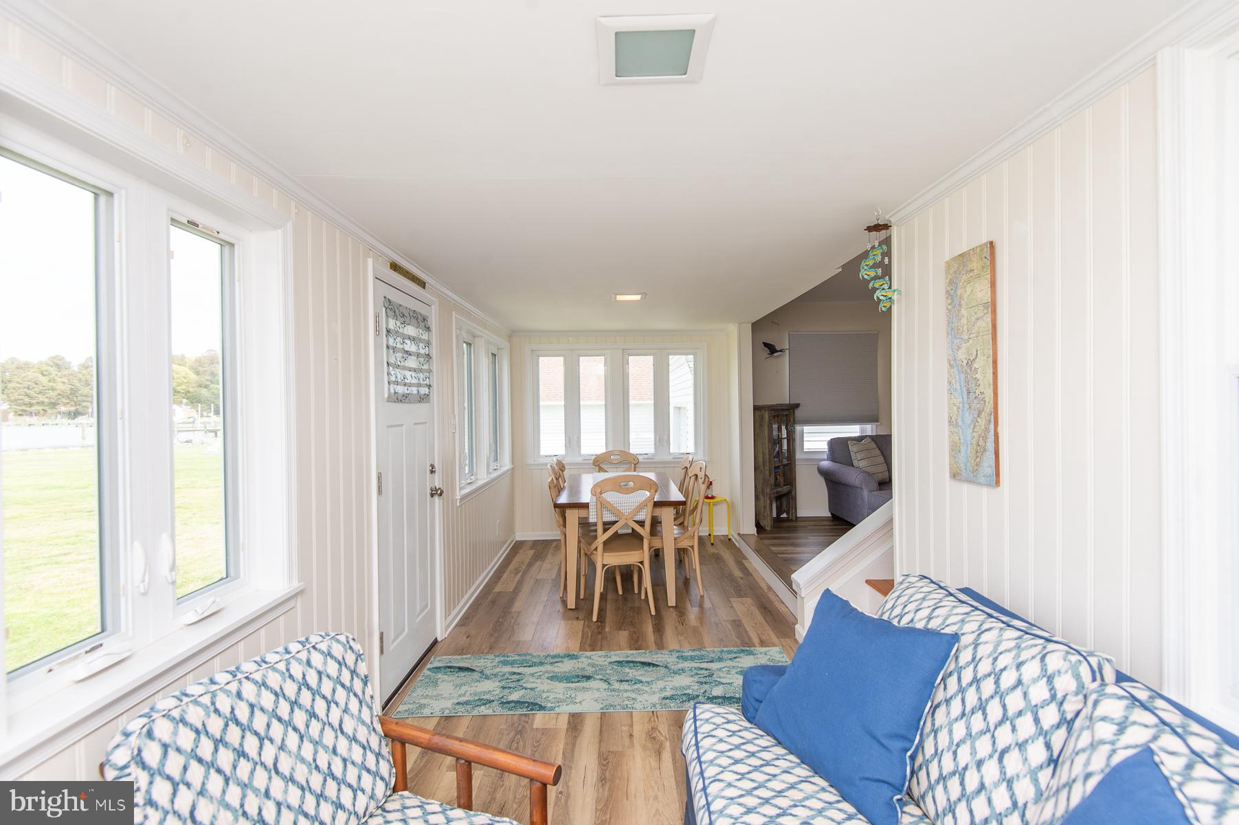 724 Twin Point Cove Road Cambridge, MD 21613 - Photo 26 of 60 Sunroom sitting area