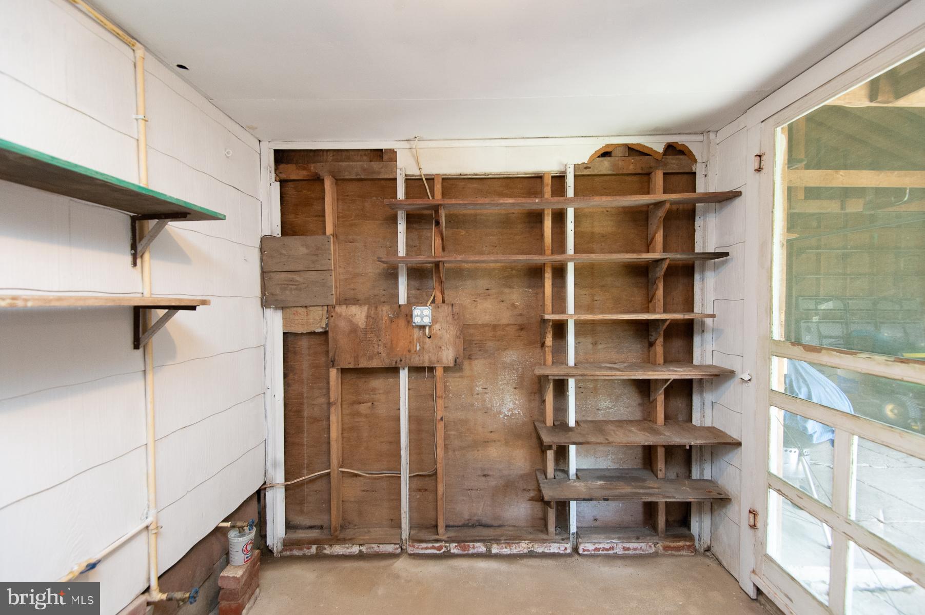 724 Twin Point Cove Road Cambridge, MD 21613 - Photo 42 of 60 Shelving in pump room