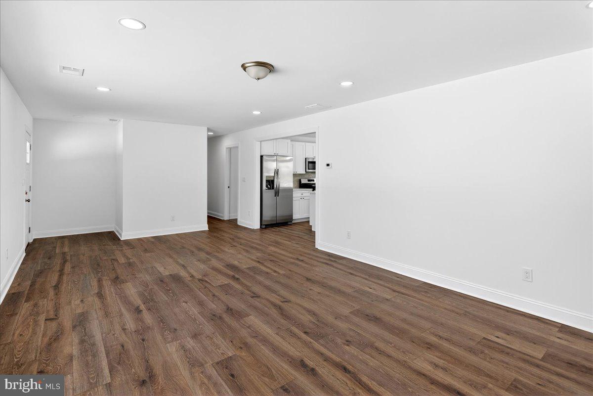 464 Sykesville Road Wrightstown, NJ 08562 - Photo 7 of 32 a view of empty room with wooden floor