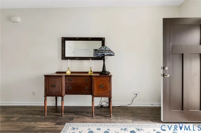 a kitchen with stainless steel appliances granite countertop a stove microwave and refrigerator