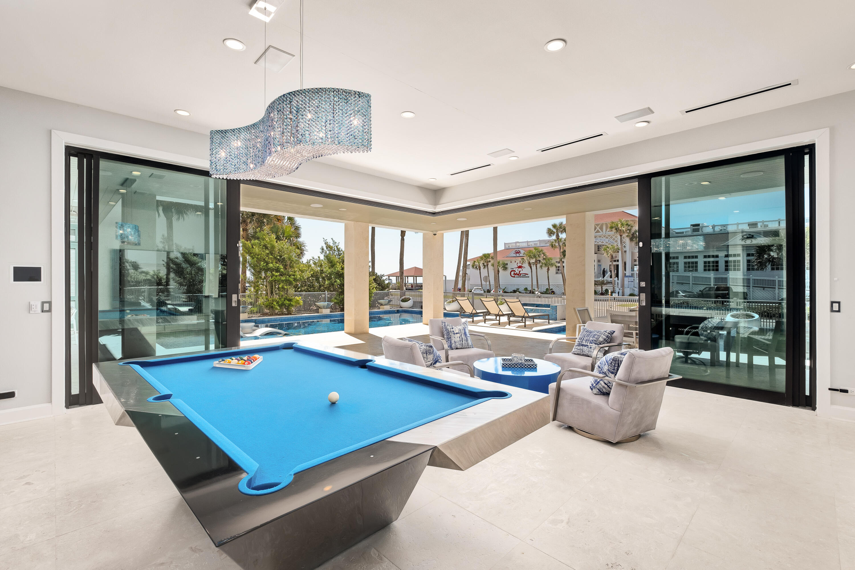 4662 Destiny Way Destin, FL 32541 - Photo 1 of 67 a room with pool table and windows