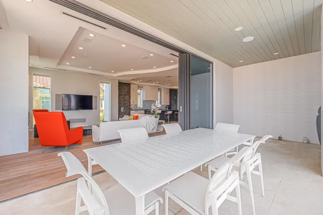 a kitchen with a sink and a stove top oven