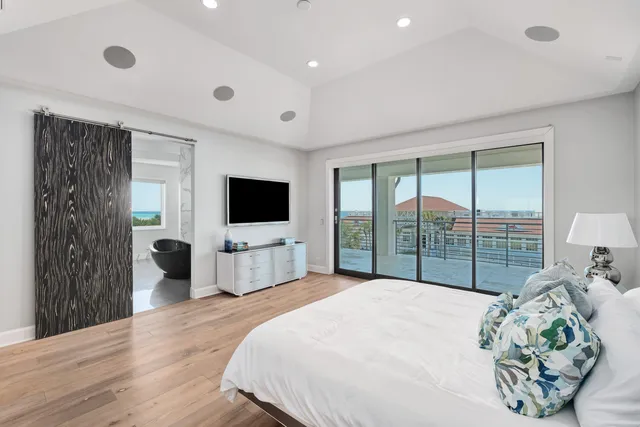 a utility room with cabinets washer and dryer