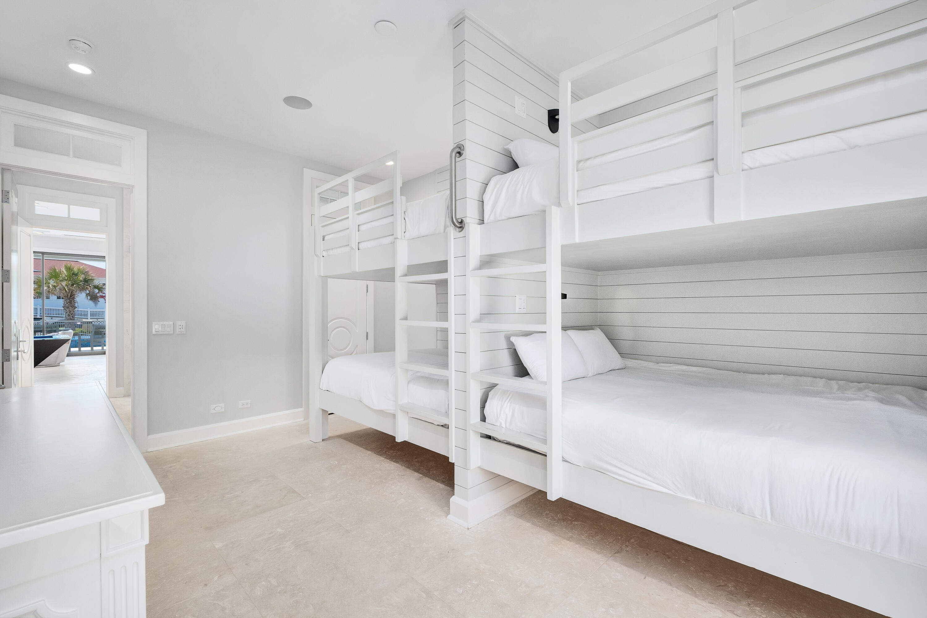4662 Destiny Way Destin, FL 32541 - Photo 46 of 67 a spacious bedroom with a bed and a window