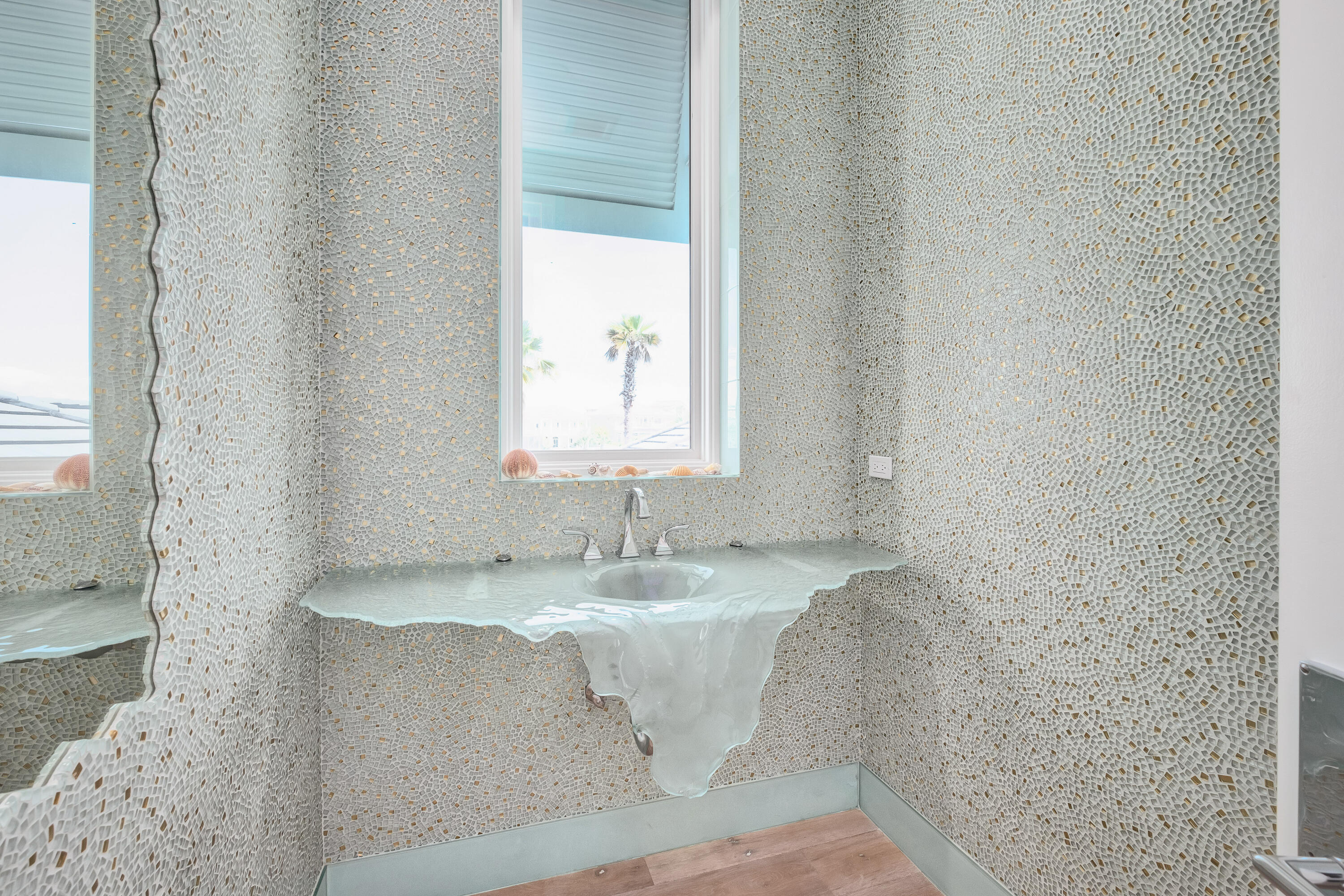 4662 Destiny Way Destin, FL 32541 - Photo 50 of 67 a bathroom with a sink and a mirror