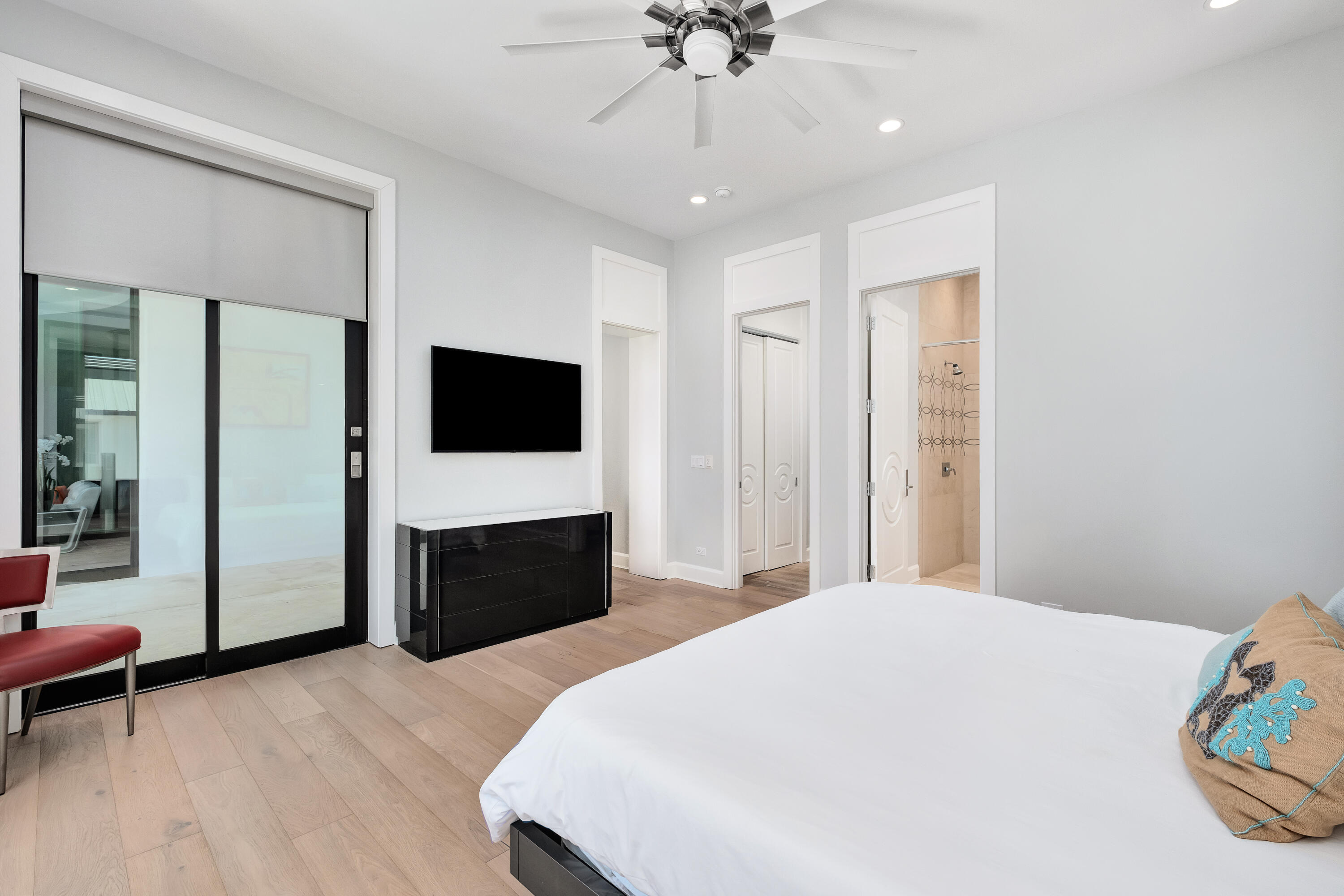 4662 Destiny Way Destin, FL 32541 - Photo 52 of 67 a bedroom with a bed and a flat screen tv