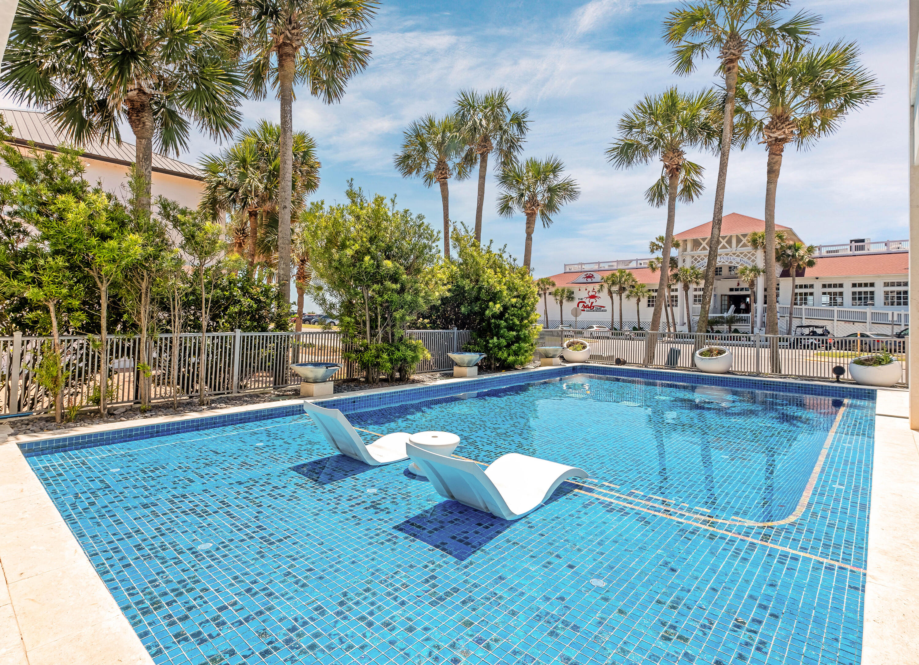 4662 Destiny Way Destin, FL 32541 - Photo 6 of 67 a view of swimming pool with a table and chair barbeque oven
