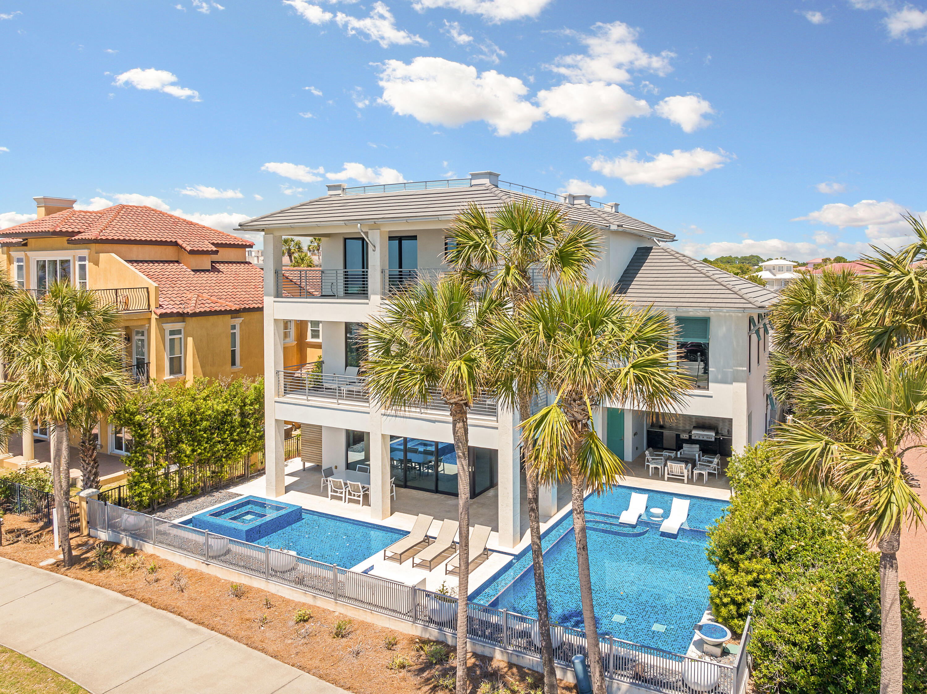 4662 Destiny Way Destin, FL 32541 - Photo 10 of 67 a front view of a house with garden