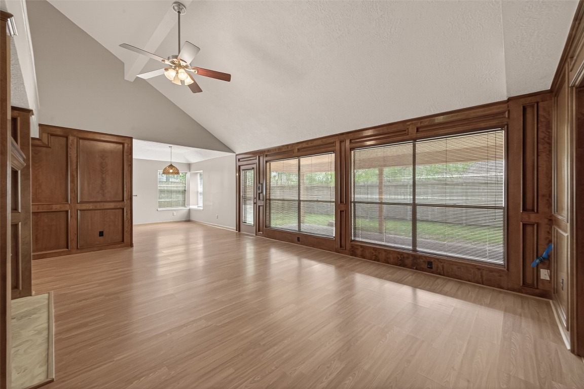 5003 Dawn Lily Drive Spring, TX 77388 - Photo 12 of 49 a view of a livingroom with wooden floor door and windows