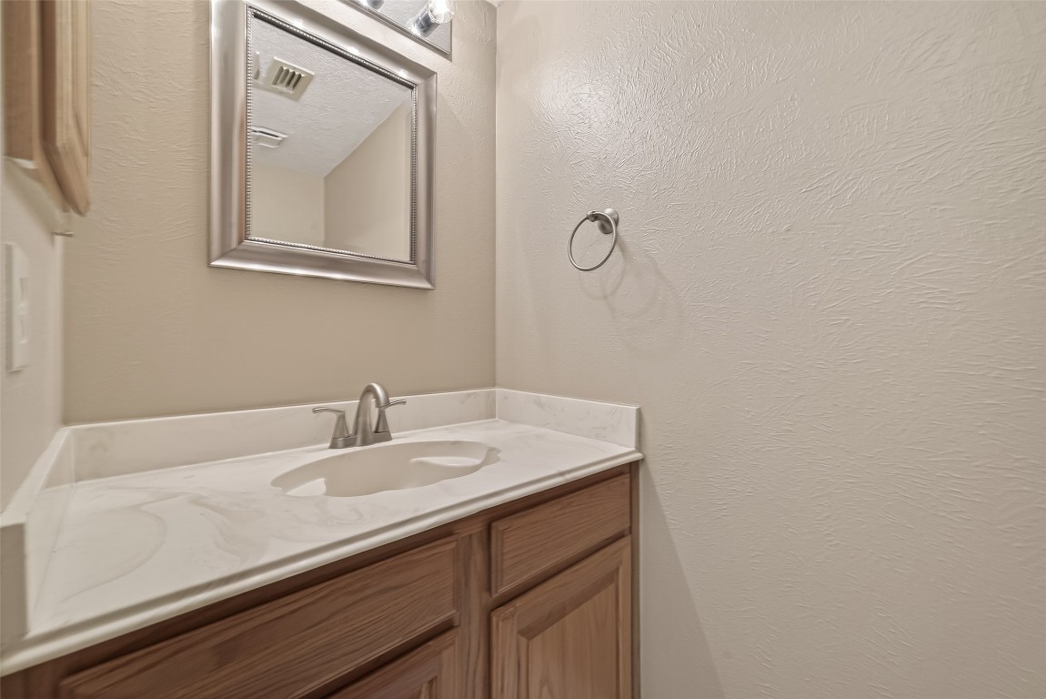 5003 Dawn Lily Drive Spring, TX 77388 - Photo 24 of 49 a bathroom with a sink and a mirror