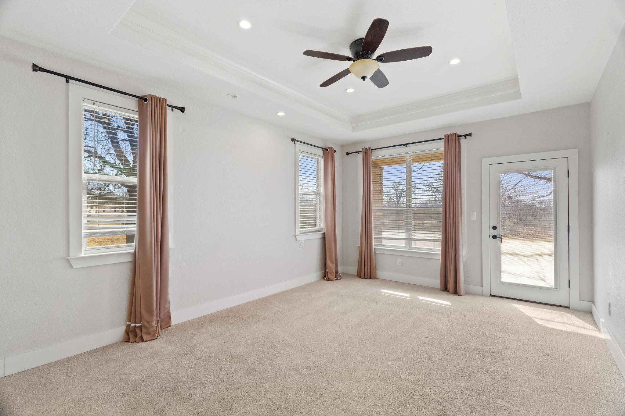 110 Chaumont Street Kingsland, TX 78639 - Photo 14 of 29 a view of a livingroom with a ceiling fan and window