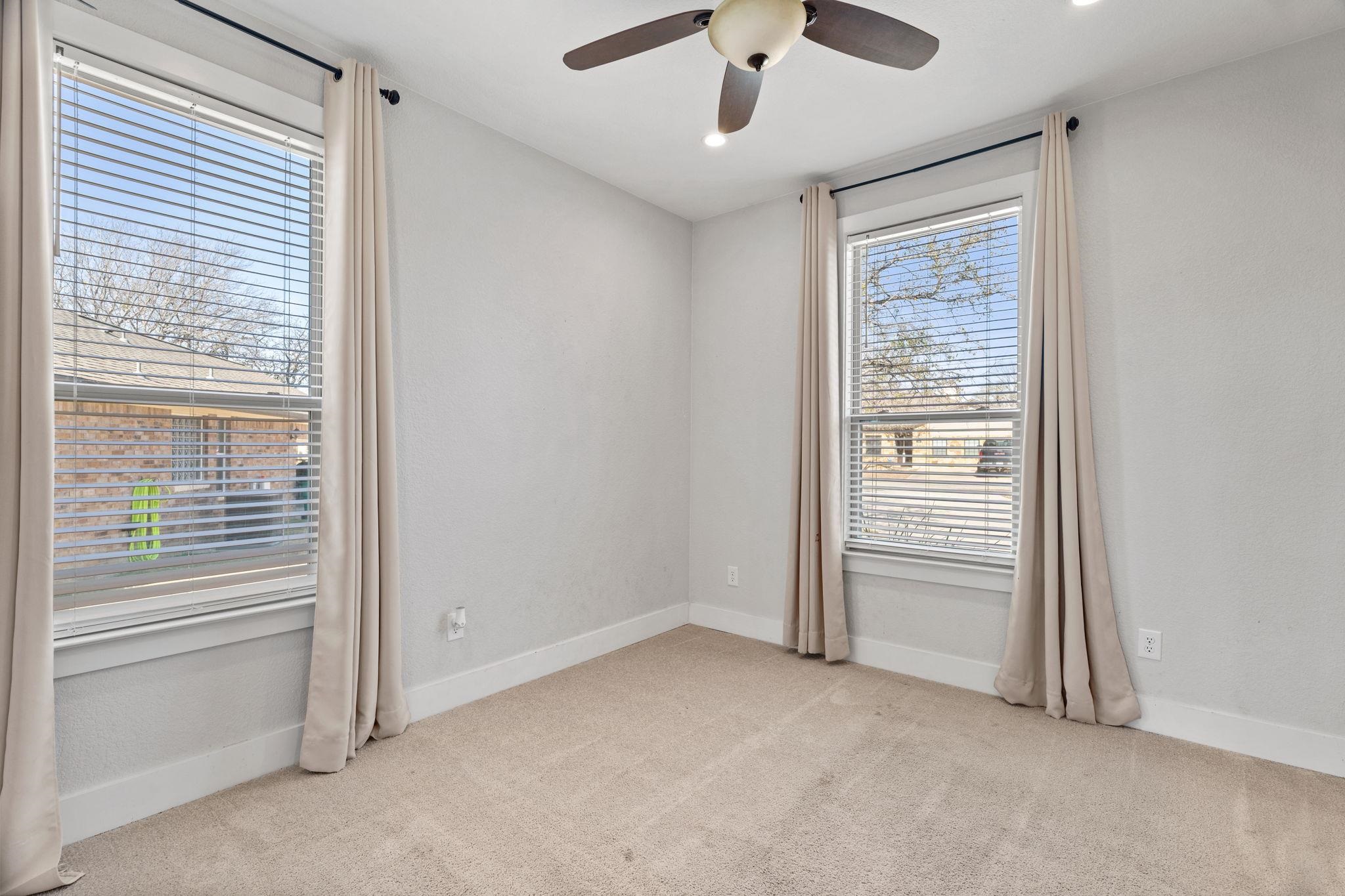 110 Chaumont Street Kingsland, TX 78639 - Photo 25 of 29 an empty room with windows