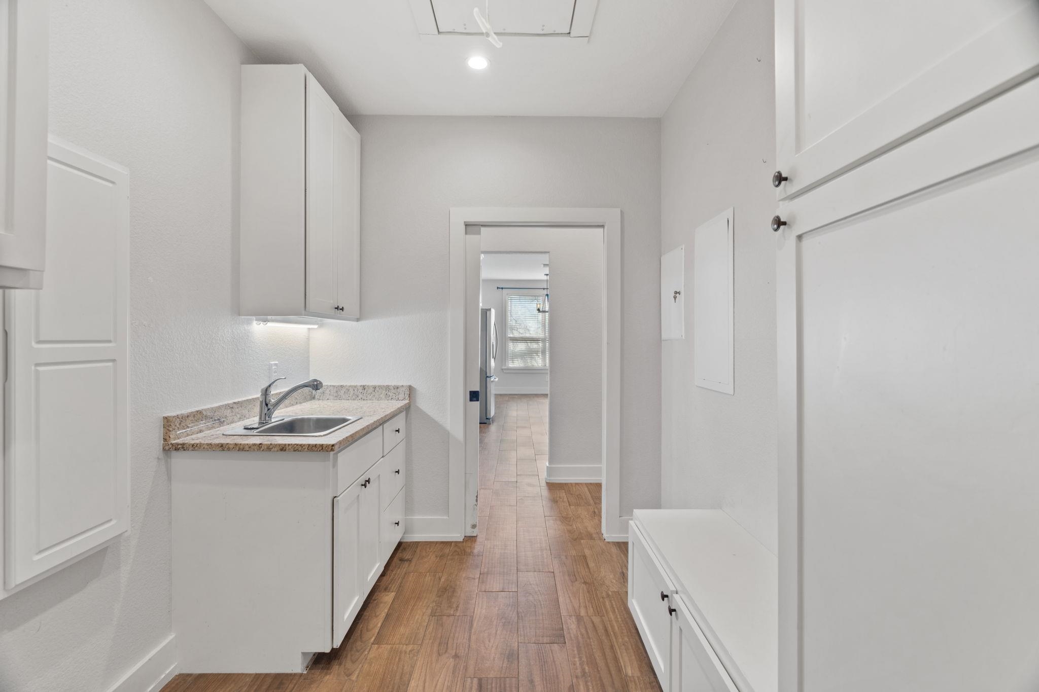 110 Chaumont Street Kingsland, TX 78639 - Photo 26 of 29 a kitchen with a sink stove and refrigerator
