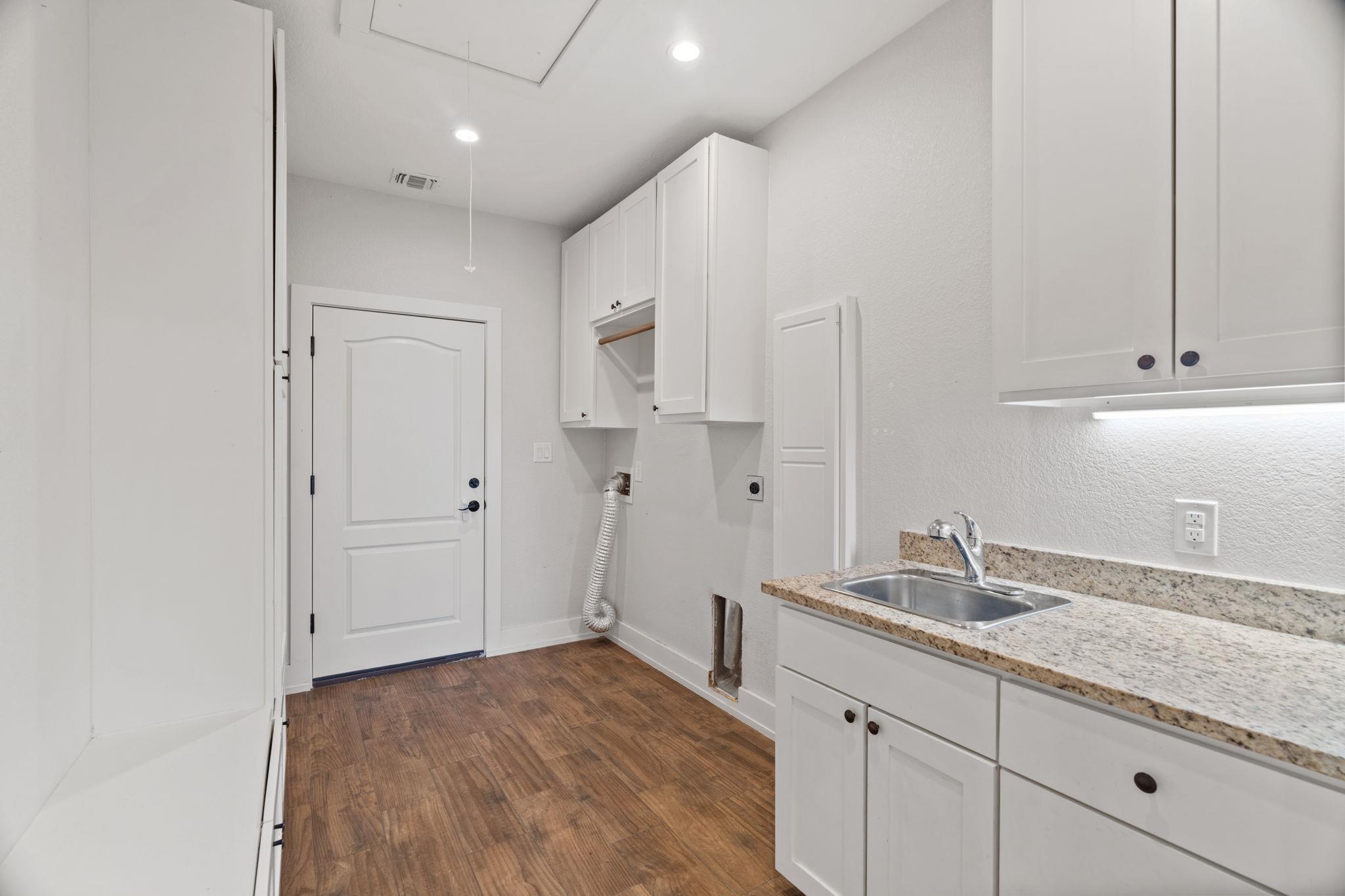 110 Chaumont Street Kingsland, TX 78639 - Photo 27 of 29 a bathroom with a sink and a mirror