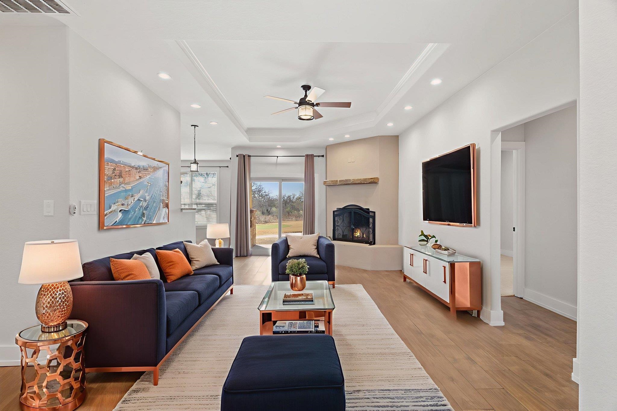 110 Chaumont Street Kingsland, TX 78639 - Photo 3 of 29 a living room with furniture fireplace and flat screen tv
