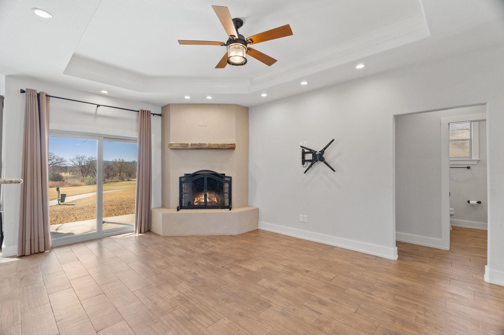 110 Chaumont Street Kingsland, TX 78639 - Photo 8 of 29 a view of a livingroom with a ceiling fan and window