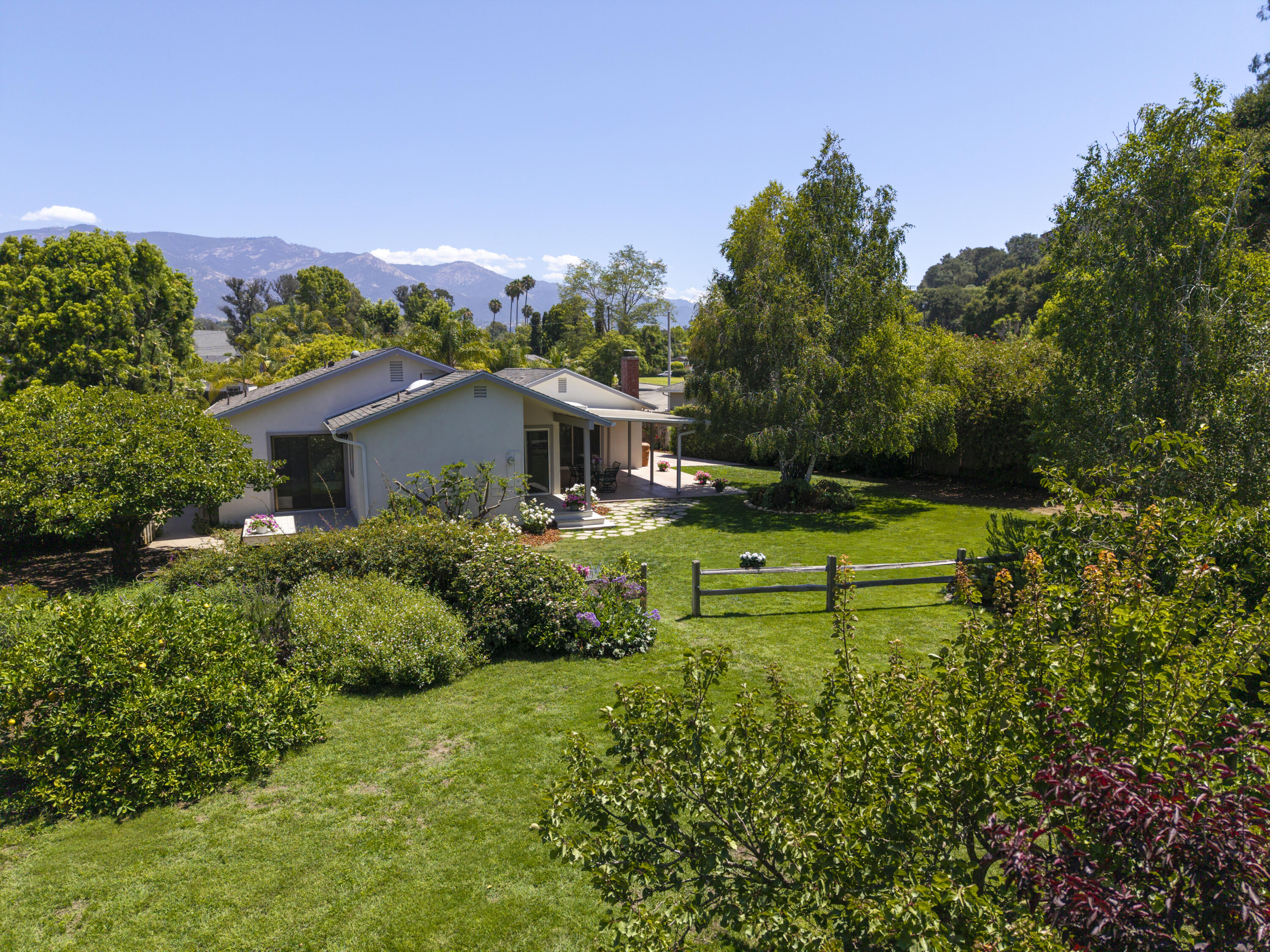 529 Via Rueda Santa Barbara, CA 93110 - Photo 3 of 34 a view of a house with a yard