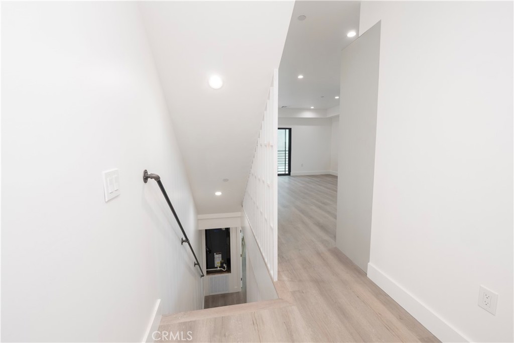 1571 Ricardo Street, Unit 2 Los Angeles, CA 90033 - Photo 19 of 29 a view of a hallway with stairs