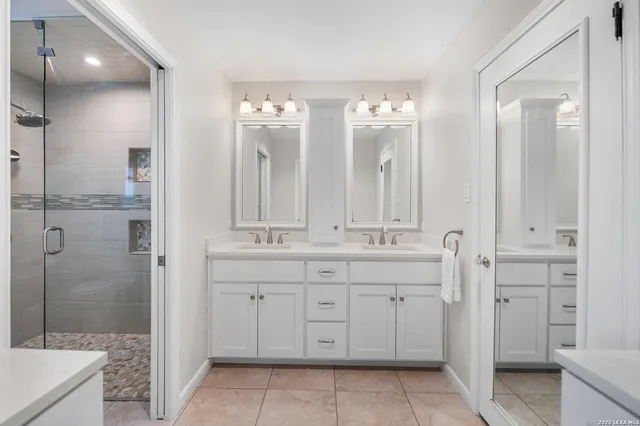 a kitchen with a sink and refrigerator