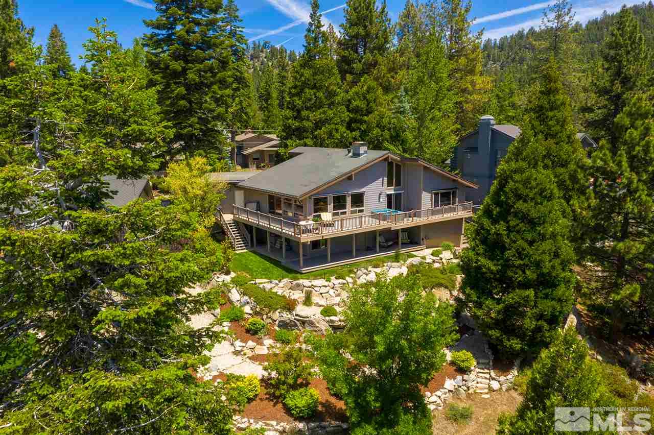 253 Cheyenne Circle Zephyr Cove, NV 89448 - Photo 24 of 25 a aerial view of a house with a yard and large trees
