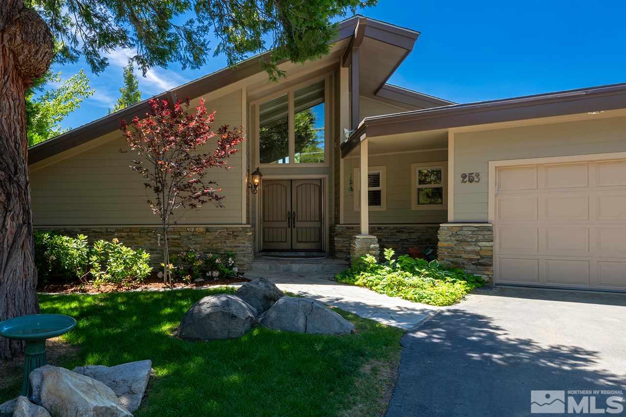 253 Cheyenne Circle Zephyr Cove, NV 89448 - Photo 3 of 25 a front view of a house with a yard