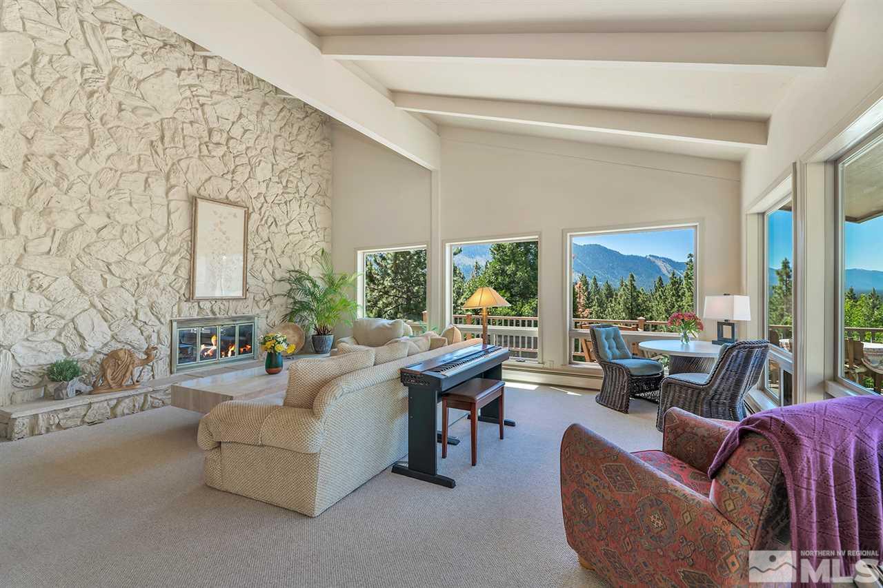 253 Cheyenne Circle Zephyr Cove, NV 89448 - Photo 6 of 25 a living room with furniture and a large window