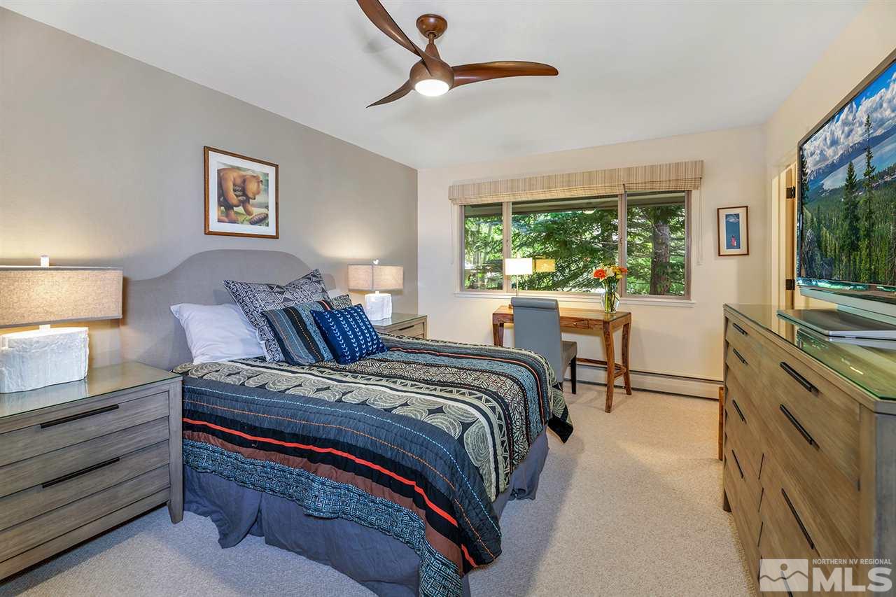 253 Cheyenne Circle Zephyr Cove, NV 89448 - Photo 9 of 25 a bedroom with a bed and a large window