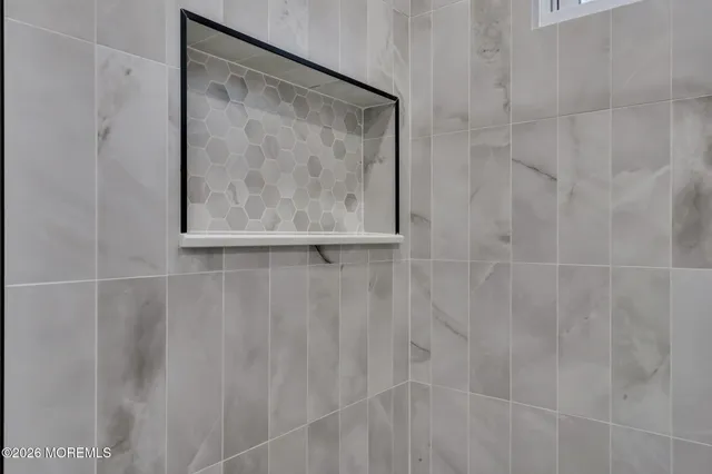 an empty room with a empty space and window