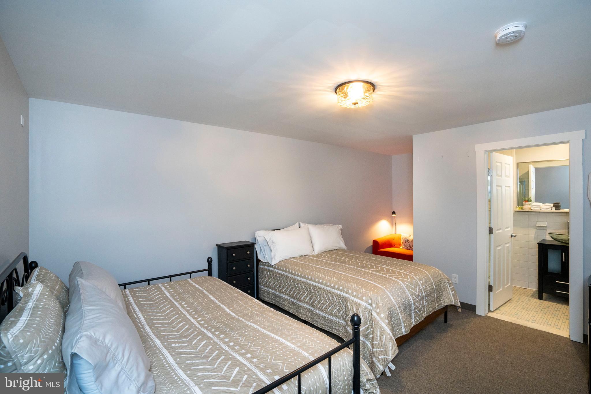 66 Front Drive Mount Union, PA 17066 - Photo 54 of 93 a bedroom with a bed and a lamp