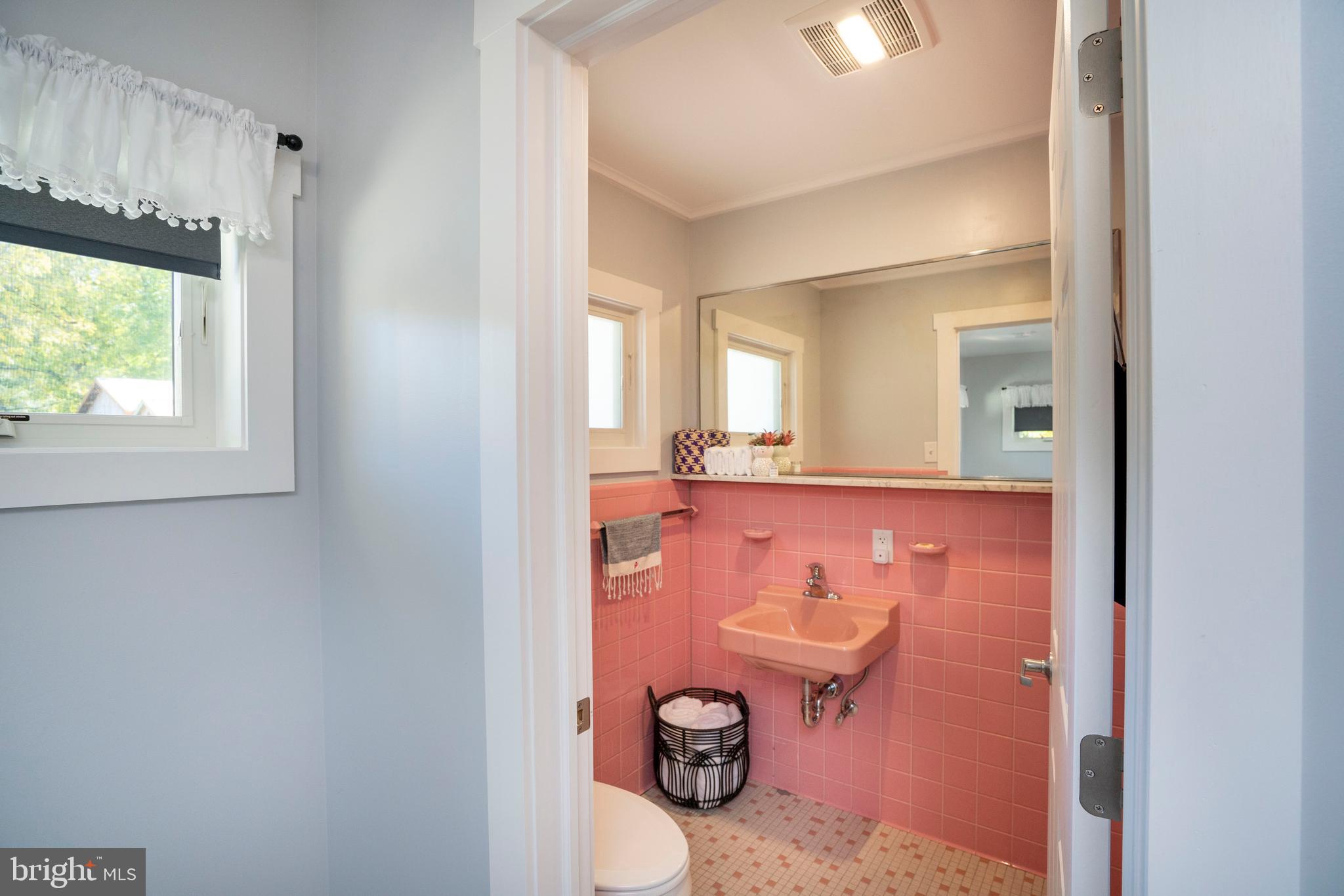66 Front Drive Mount Union, PA 17066 - Photo 60 of 93 a bathroom with a granite countertop sink and a mirror