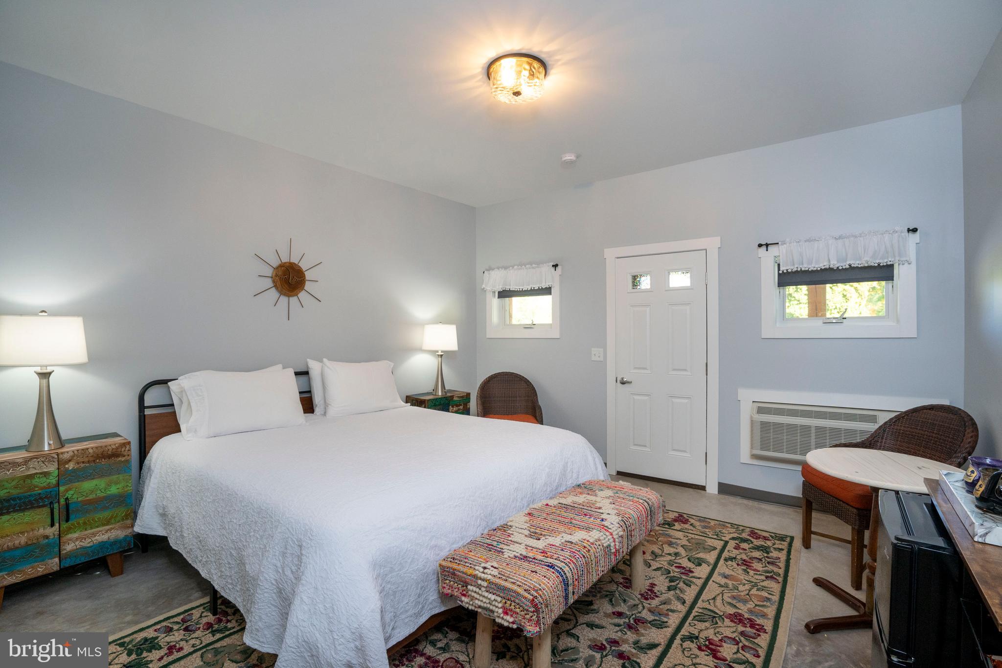 66 Front Drive Mount Union, PA 17066 - Photo 62 of 93 a bedroom with a bed and a table in it