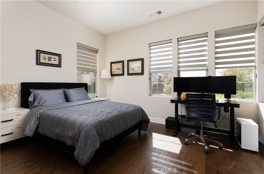 93 Turnstone Irvine, CA 92618 - Photo 17 of 52 a bedroom with a bed and a television