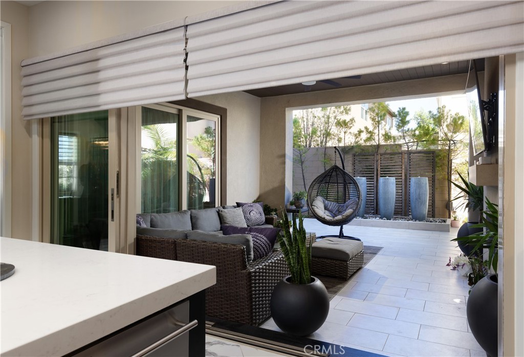 93 Turnstone Irvine, CA 92618 - Photo 20 of 52 a living room with furniture a large window with outer view