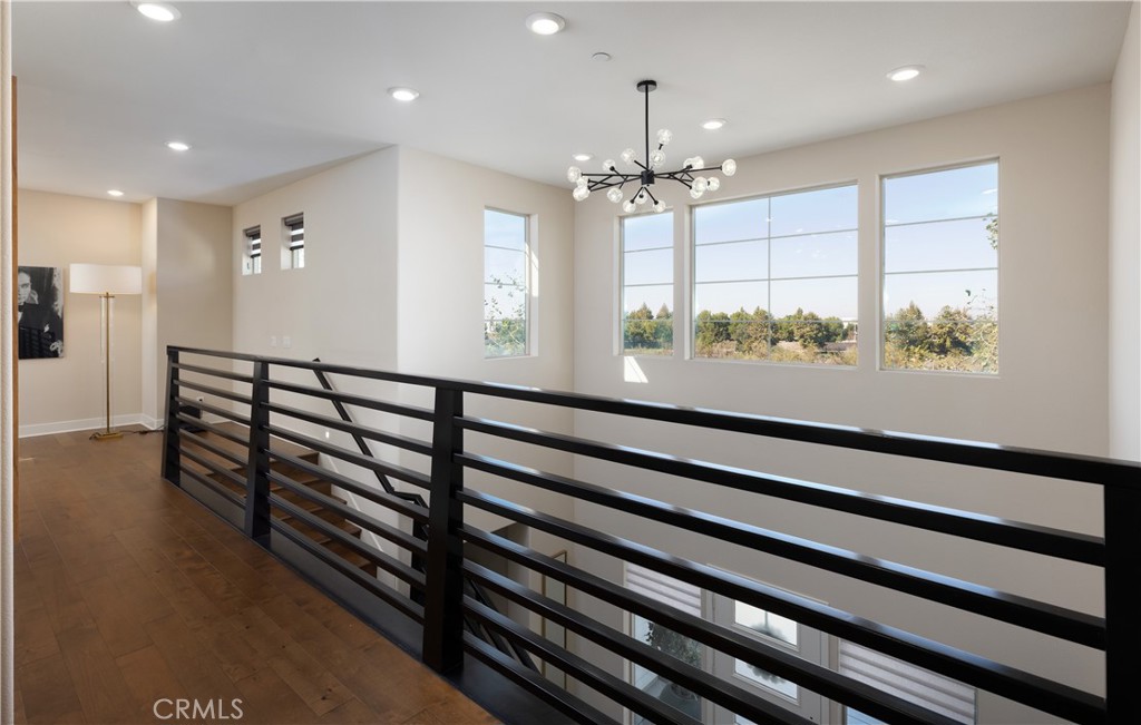 93 Turnstone Irvine, CA 92618 - Photo 26 of 52 a view of a room with wooden floor and windows