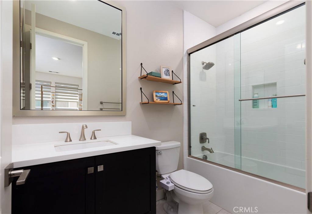 93 Turnstone Irvine, CA 92618 - Photo 28 of 52 a bathroom with a sink toilet and shower