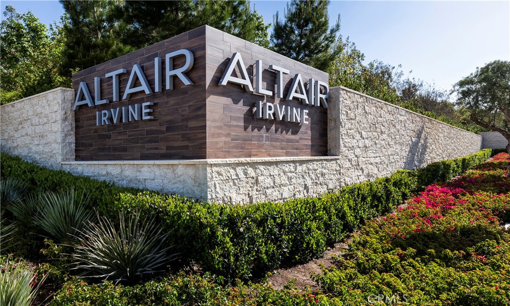 93 Turnstone Irvine, CA 92618 - Photo 4 of 52 a view of sign board with flower around