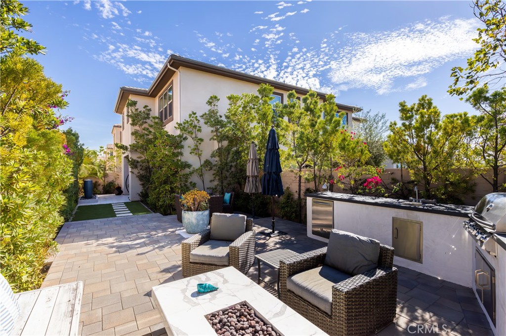 93 Turnstone Irvine, CA 92618 - Photo 41 of 52 a view of backyard with outdoor seating and plants