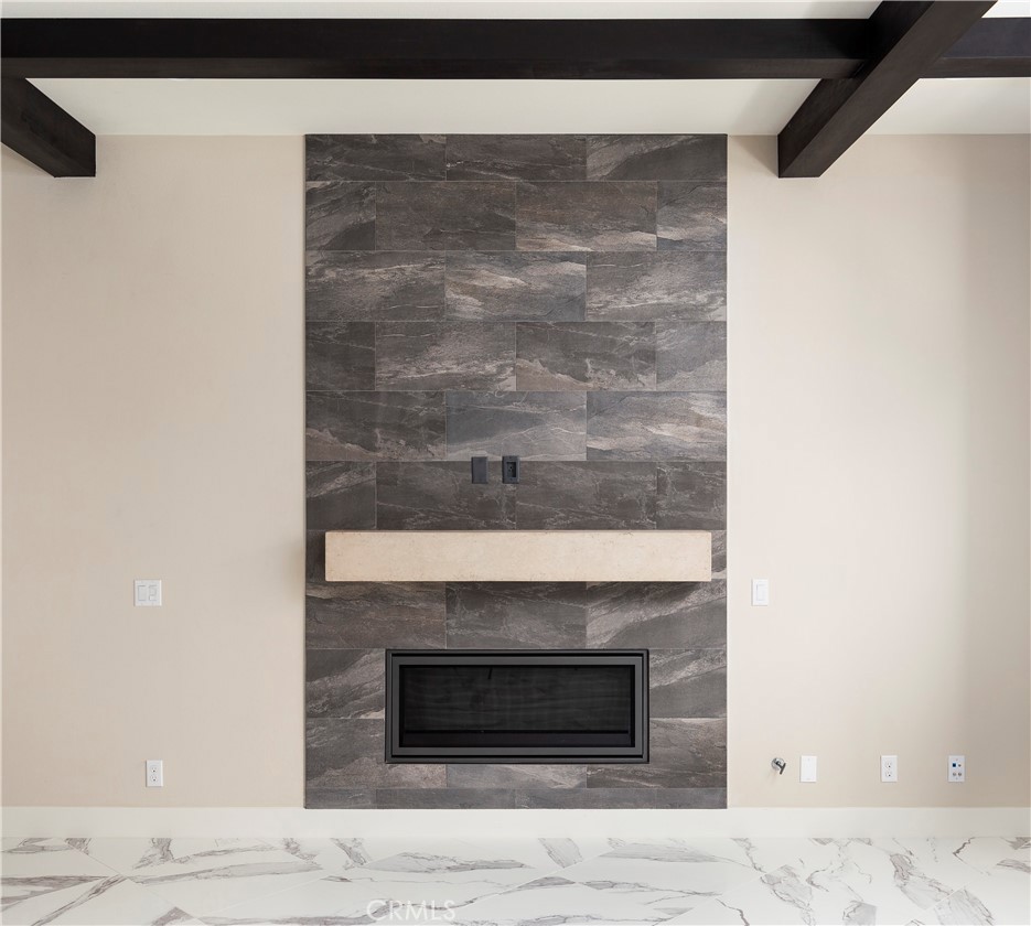 93 Turnstone Irvine, CA 92618 - Photo 45 of 52 a fireplace with a hallway