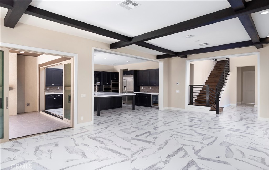 93 Turnstone Irvine, CA 92618 - Photo 46 of 52 a view of a hallway with wooden shelves