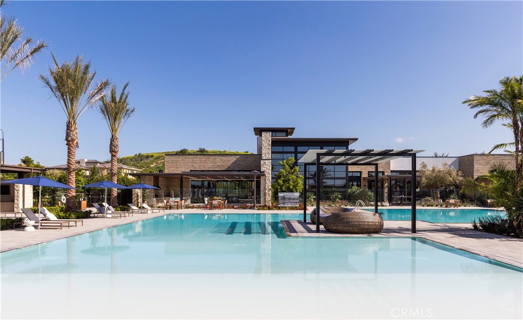 93 Turnstone Irvine, CA 92618 - Photo 8 of 52 a view of a swimming pool with an outdoor seating