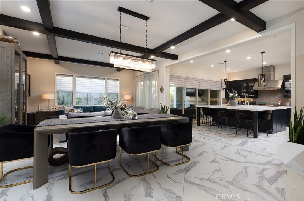 93 Turnstone Irvine, CA 92618 - Photo 10 of 52 a kitchen with a sink and wooden cabinets
