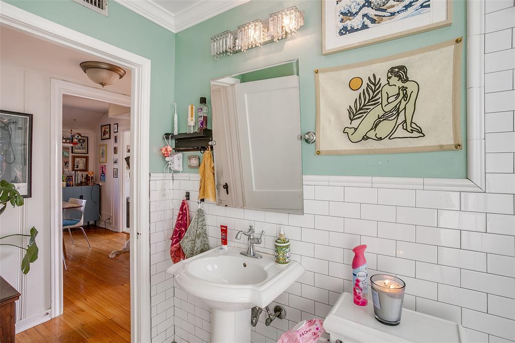 4339 Pershing Avenue Fort Worth, TX 76107 - Photo 14 of 19 a bathroom with a sink and a mirror