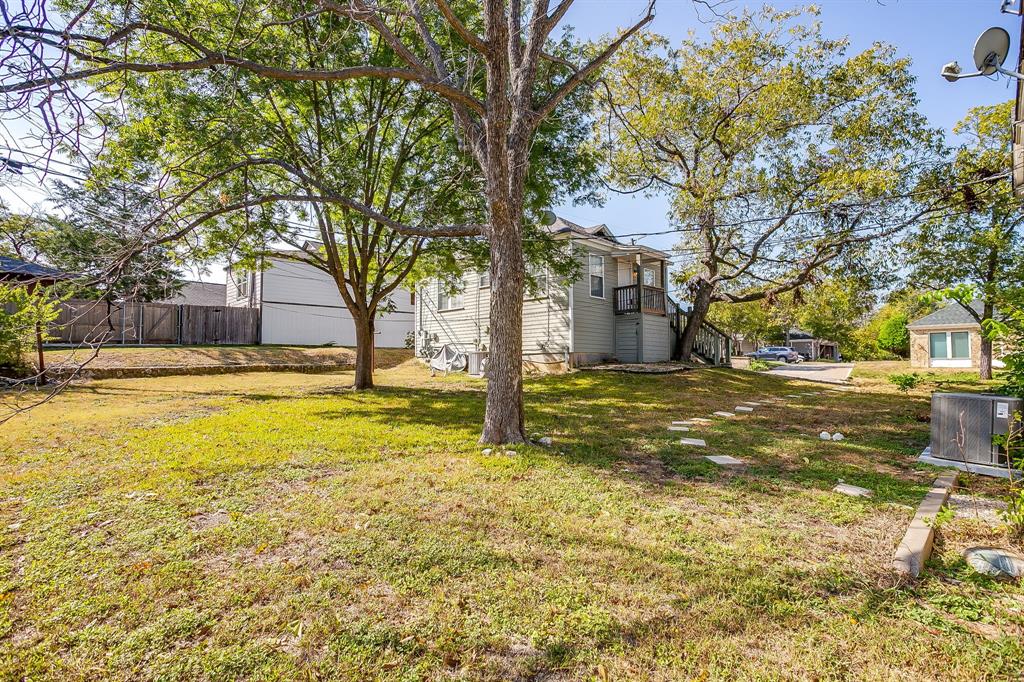 4339 Pershing Avenue Fort Worth, TX 76107 - Photo 19 of 19 a swimming pool with trees in the background