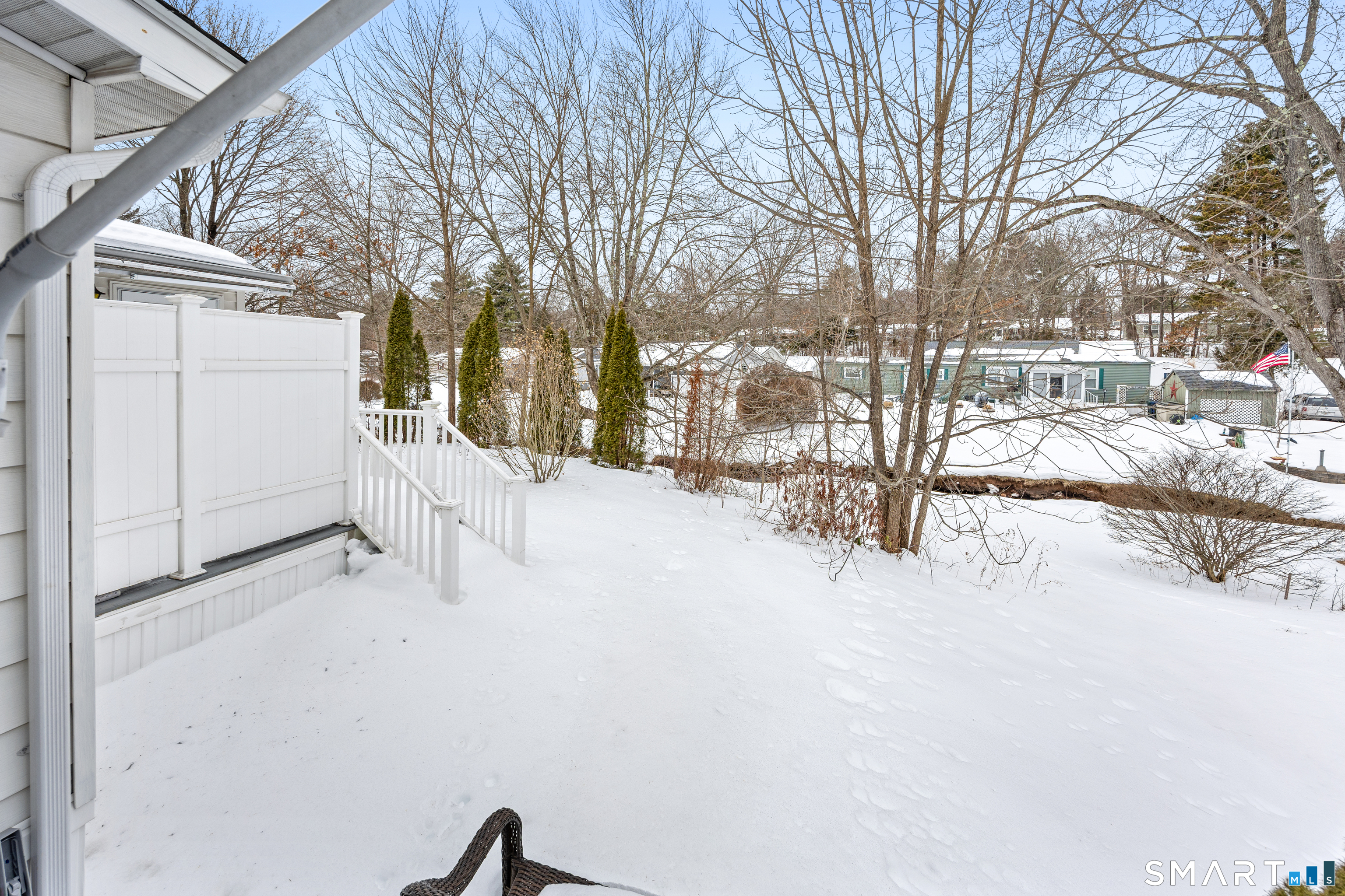 8 Redstone Street Southington, CT 06489 - Photo 18 of 18 a view of a yard covered in snow