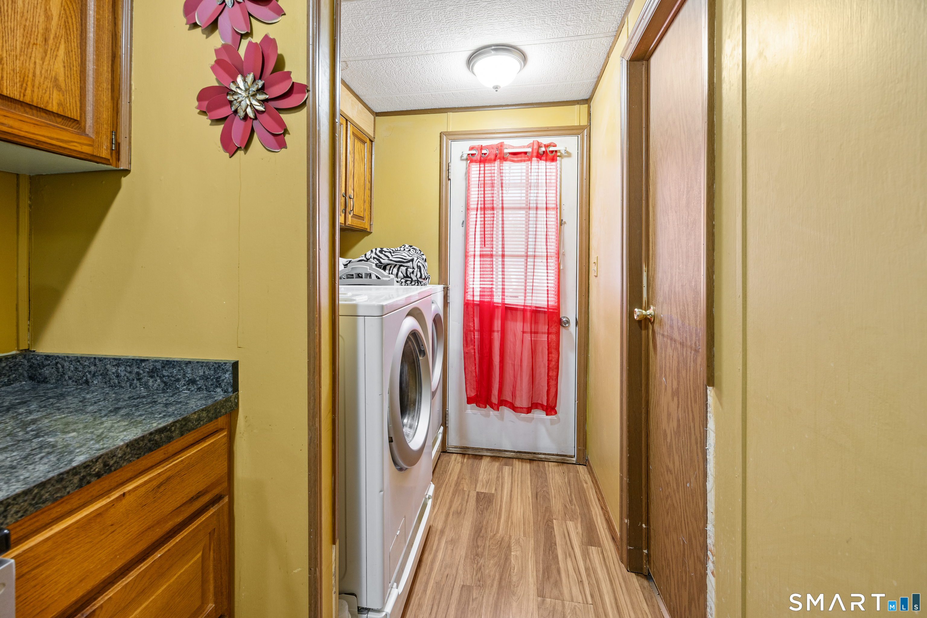 8 Redstone Street Southington, CT 06489 - Photo 7 of 18 a utility room with dryer and washer