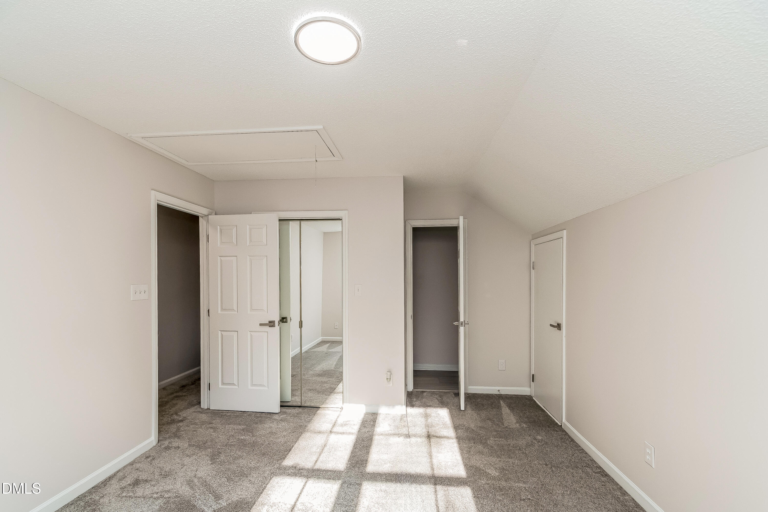 6005 Chittim Court Raleigh, NC 27616 - Photo 14 of 19 a view of a room with an entryway